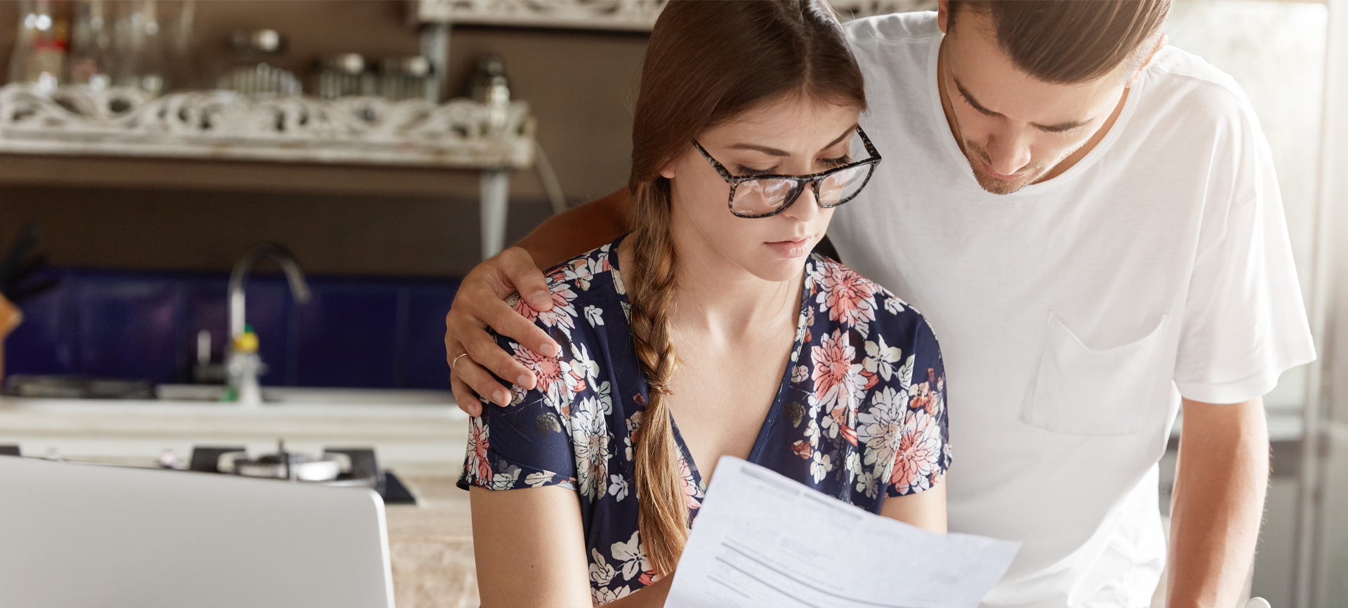 couple-managing-budget-together-kitchen